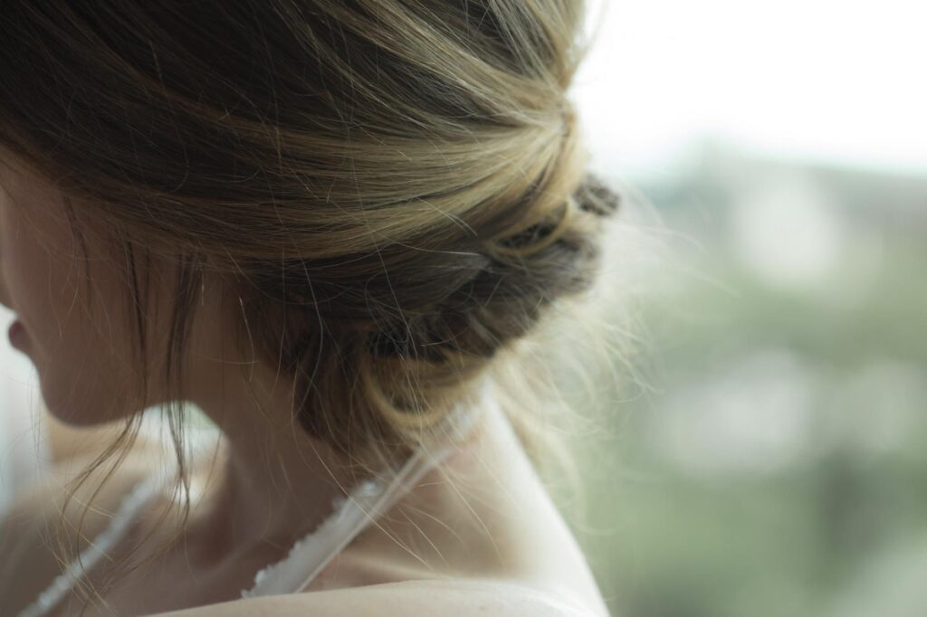 woman wearing white halter neck top